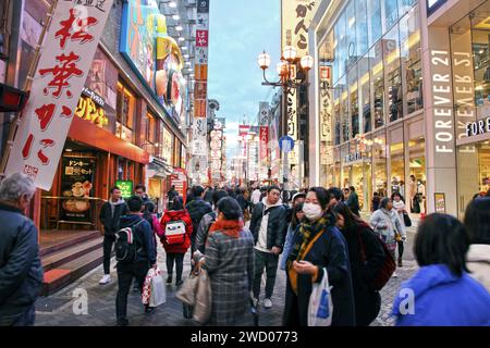 Dotonbori is Osaka's principal tourist and nightlife area famed for its restaurants, shopping, canal and neon signboards. Stock Photo
