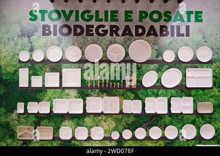 Milan, Italy - January 17, 2024: biodegradable crockery and cutlery displayed in a homeware shop against plastic on our tables Stock Photo