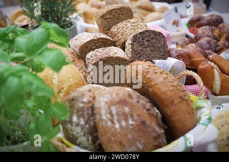 Milan, Italy - January 17, 2024: Fresh bread on shelves in a bakery Stock Photo