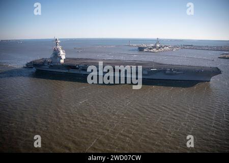 The world’s largest aircraft carrier USS Gerald R. Ford (CVN 78), arrives in Norfolk, Virginia, following its eight-month maiden deployment, Jan. 18, 2023. The Gerald R. Ford Carrier Strike Group (GRFCSG) completed a scheduled deployment in U.S. Naval Forces Europe-Africa/US Sixth Fleet area of operations, demonstrating the commitment and power projection capability of the Navy’s globally deployed force. (U.S. Navy photo by Mass Communication Specialist 2nd Class Jacob Mattingly) Stock Photo