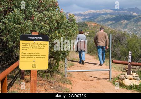 Border crossing warning sign with wilderness boundary sign, Pine Creek Wilderness, Cleveland National Forest, California Stock Photo