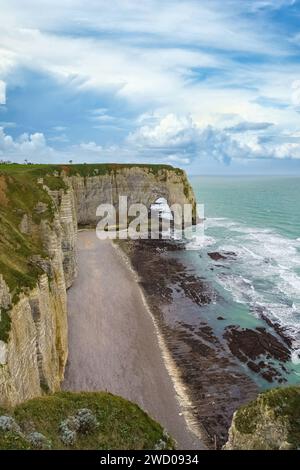 Drone view on Etretat village in Normandy and beach and water of Manche ...