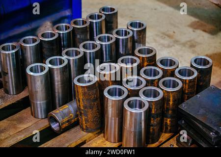 Steel bushings made on lathe. Spare parts. Stock Photo