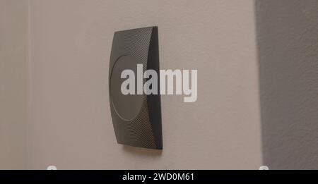 Magnetic door lock on grey wall. Home security Stock Photo