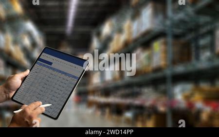 Warehouse management engineer holding tablet management dashboard Electronic inventory management concept Stock Photo