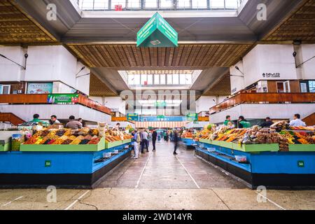 Various vendors and stalls selling dried fruit products and nuts. At the main local, Soviet era food market, the Green Bazaar. In Almaty, Kazakhstan. Stock Photo