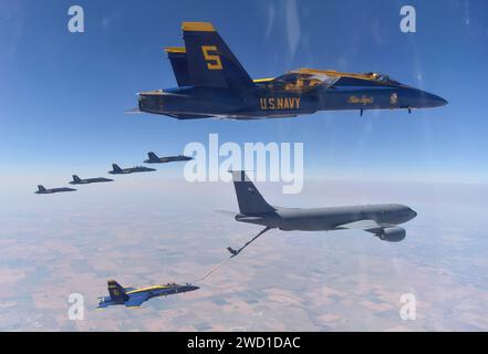 The U.S. Navy Blue Angels team conduct aerial refueling operations with a KC-135 Stratotanker. Stock Photo