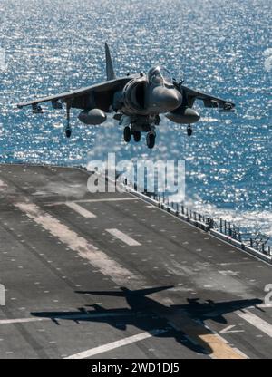 An AV-8B Harrier lands on the flight deck of USS Bonhomme Richard. Stock Photo