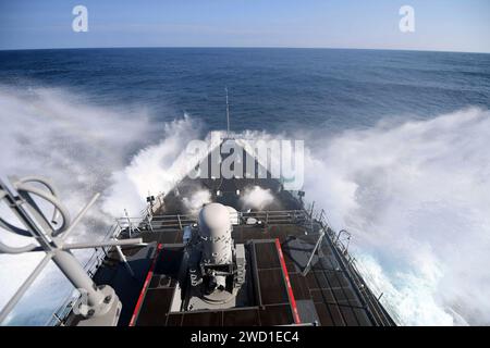 Amphibious dock landing ship USS Carter Hall transits the Atlantic Ocean. Stock Photo