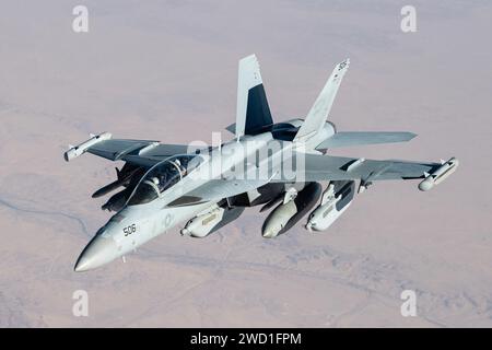 A U.S. Navy E/A-18G Growler flying in support of Operation Inherent Resolve. Stock Photo