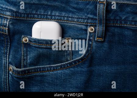 Antalya, Turkey - January 15, 2024: White wireless headphones Apple AirPods 3 Stock Photo
