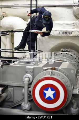 The engineering department aboard the amphibious assault ship USS Bonhomme Richard. Stock Photo