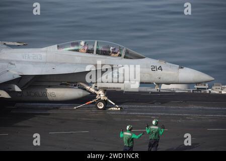 An F/A-18F Super Hornet prepares to launch from the aircraft carrier USS George H.W. Bush. Stock Photo