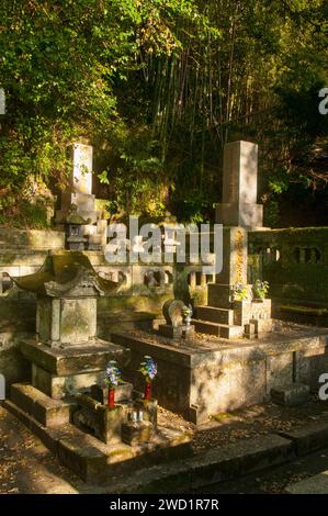 Japan: Cemetery, Sofuku-ji, Obaku Zen temple, Nagasaki, Kyushu. The temple, an example of Ming dynasty (1368 - 1644), southern Chinese architecture, dates from 1629 and was built by a Chinese monk named Chaonian. Stock Photo