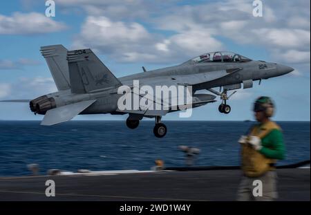 An F/A18F Super Hornet takes off from the aircraft carrier USS George H.W. Bush. Stock Photo