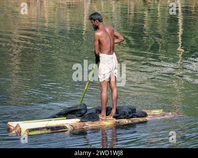 Man with net in backyard pool trying to catch non existent fish Chicago  Illinois USA Stock Photo - Alamy