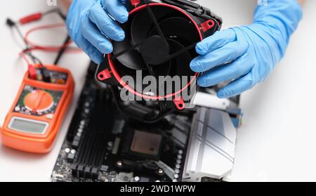 Cleaning and repairing personal computer and replacing or installing fan Stock Photo