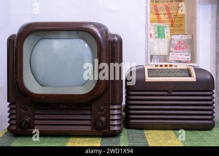 A 1950s television set and wireless radio, retro vintage exhibits in a museum, England, UK Stock Photo