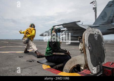 An EA-18G Growler launches from the flight deck of USS Ronald Reagan. Stock Photo