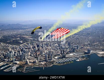 The U.S. Navy Parachute Team, the Leap Frogs, conducts a demonstration jump over Coronado, California. Stock Photo