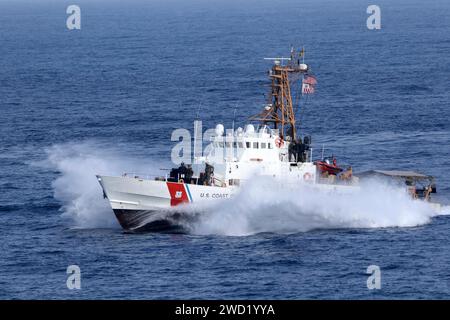 The U.S. Coast Guard cutter USCGC Adak (WPB 1333) transits the Strait of Hormuz. Stock Photo