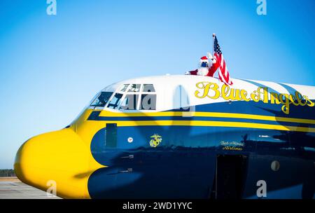 Santa Claus waving from a C-130 aicraft of the U.S. Navy Blue Angels. Stock Photo