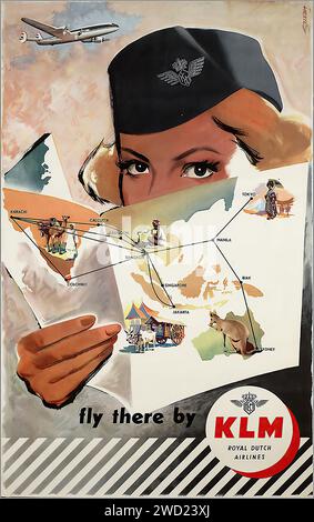 'fly there by KLM' 'ROYAL DUTCH AIRLINES' 'Frans Mettes' A colorful poster by Frans Mettes, with a stewardess's face peering over a map that features cultural symbols and animals representing various destinations. It's a classic mid-century travel advertisement for KLM, the Royal Dutch Airlines. Stock Photo