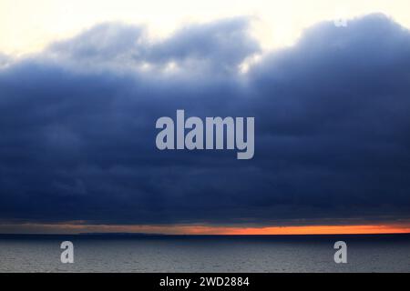 Heavy storm clouds over the Baltic Sea . Stock Photo