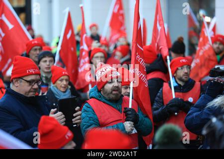 Public sector workers from Northern Ireland Public Service Alliance (NIPSA) on the picket line outside the Northern Ireland Office (NIO) at Erskine House, Belfast, as an estimated 150,000 workers take part in walkouts over pay across Northern Ireland. The strike is set to have a major impact with schools closed, hospitals offering only Christmas Day-level services, public transport cancelled as well as limited gritting of the roads in zero-degree temperatures. Picture date: Thursday January 18, 2024. Stock Photo