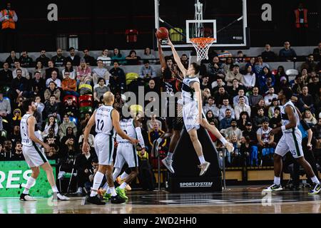 Joventut Badalona defeat London Lions in a tightly fought Eurocup game at the copper box arena, London on 17 January, 2024. Badalona block Donte Grantham's shot. copyright caroljmoir Stock Photo