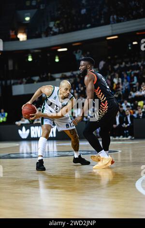 Joventut Badalona defeat London Lions in a tightly fought Eurocup game at the copper box arena, London on 17 January, 2024. Badalona's Andrew Andrews with the ball. Lions' David Nwaba defends. copyright caroljmoir Stock Photo