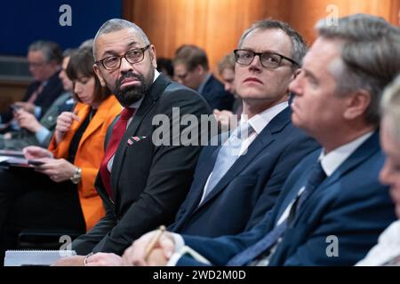 Home Secretary James Cleverly (centre left) and Minister of State for Countering Illegal Migration Michael Tomlinson (centre right) attend a press conference in Downing Street, London, held by Prime Minister Rishi Sunak after he saw the Safety of Rwanda Bill pass its third reading in the House of Commons by a majority of 44 on Wednesday evening. Picture date: Thursday January 18, 2024. Stock Photo