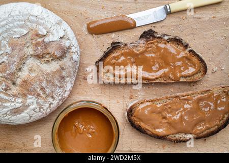 Smooth peanut butter on Sourdough toast Stock Photo