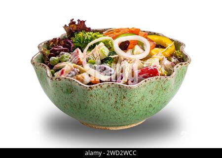 View of salad bowl isolated on white background with clipping path. Healthy colorful chicken meat salad with crab stick and various vegatable. Stock Photo