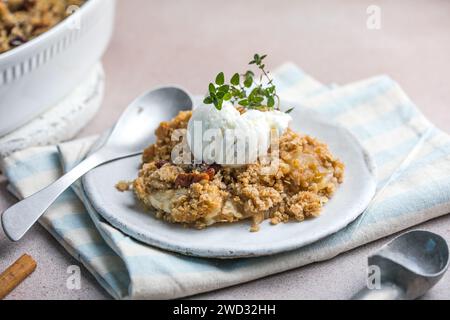 close up of apple crumble and ice cream Stock Photo