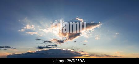 Dramatic sunset in the sky with clouds. Stock Photo