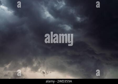Dramatic sky background with dark rainy clouds before the storm. Stock Photo