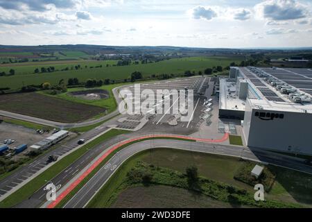 Aerial view of distribution center, drone photo of industrial logistics zone,new super modern logistics center full of modern technology and robotics Stock Photo