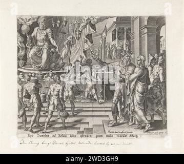 King Cyrus shows Daniël the image of the God Bel, Philips Galle, After Maarten van Heemskerck, 1601 - 1633 print King Cyrus shows Daniël the Temple of the God Bel. In the middle of the temple is a large image of the sitting deity. There are vases with smell work around it. Servants are busy displaying eating and drinking on a table for the image. print maker: Haarlempublisher: Antwerp paper engraving King Cyrus sets food before the image of Bel; Daniel and his servants strew ashes on the floor of the temple Stock Photo