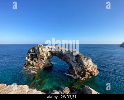 Beautiful view on natural rock arch (13 meters high) at viewpoint, Mirador Es Pontas on Mallorca island, Santanyí, Balearic islands, Spain Stock Photo