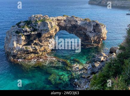 Beautiful view on natural rock arch (13 meters high) at viewpoint, Mirador Es Pontas on Mallorca island, Santanyí, Balearic islands, Spain Stock Photo