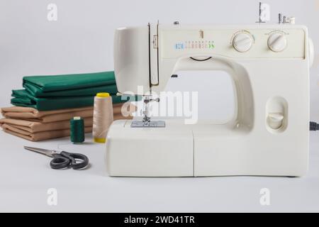 Fabric and thread for using a sewing machine. Stock Photo