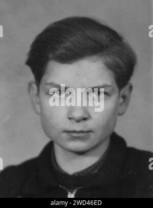 The antique photo shows a studio portrait of a teenager wearing a zip-up sports jacket. Germany. Date unknown, circa 1930s Stock Photo