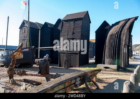 Traditional black-tarred net huts, Hastings, East Sussex, UK Stock Photo