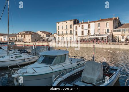 Marseillan, France - December 30, 2018: Pleasure boat docked in the small port of Marseillan on a winter day Stock Photo