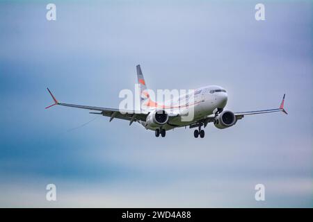 Boeing 737 Max 8 Commercial airline (OK -SWA) operated by smart wings, landing in strong winds and turbulence in Europe. Stock Photo