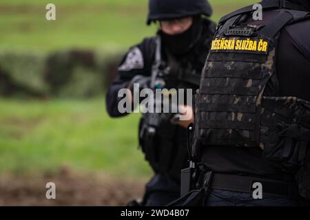 Special forces SWAT team shootout and arresting criminal terrorists during operation in the Czech Republic. Armed police operators during training Stock Photo