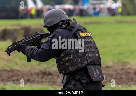 Special forces SWAT team shootout and arresting criminal terrorists during operation in the Czech Republic. Armed police operators during training Stock Photo