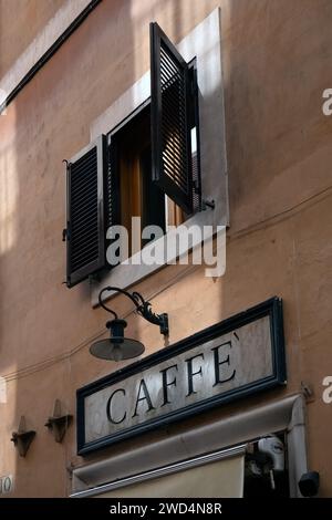 ROME, ITALY - SEPTEMBER 19, 2023:  Caffe sign with wooden shutters in the city centre Stock Photo