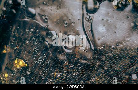 Dark abstract background with droplets. Stock Photo